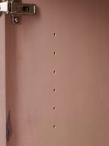 Golden retriever puppy playing with a ball