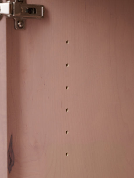 Golden retriever puppy playing with a ball