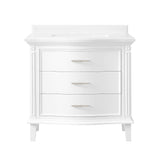 Golden retriever puppy playing with a ball