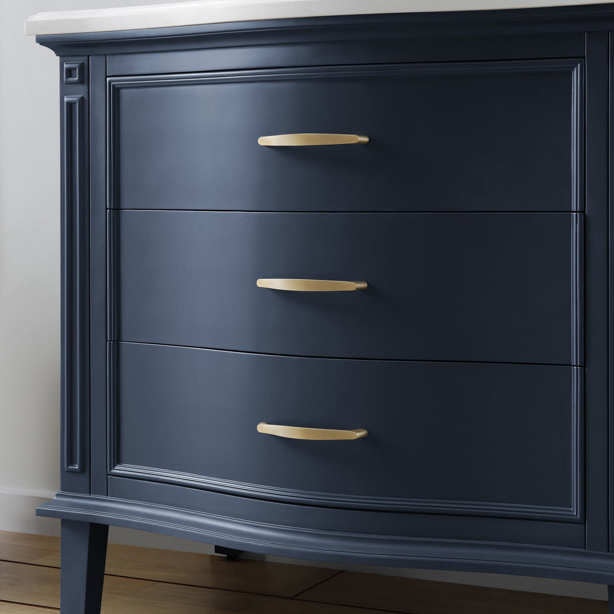 Golden retriever puppy playing with a ball