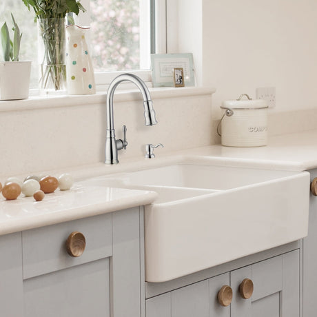Golden retriever puppy playing with a ball