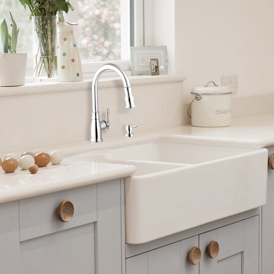 Golden retriever puppy playing with a ball