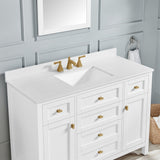 Golden retriever puppy playing with a ball