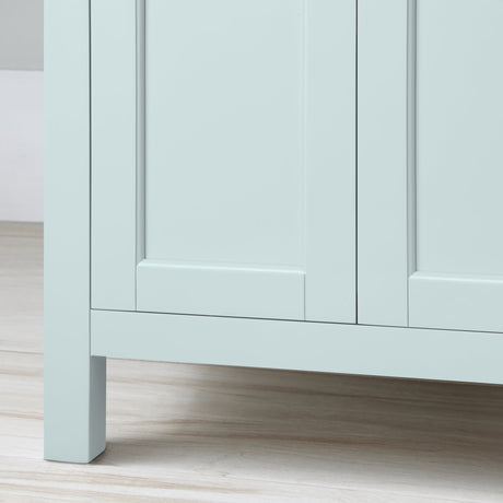 Golden retriever puppy playing with a ball