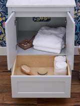 Golden retriever puppy playing with a ball