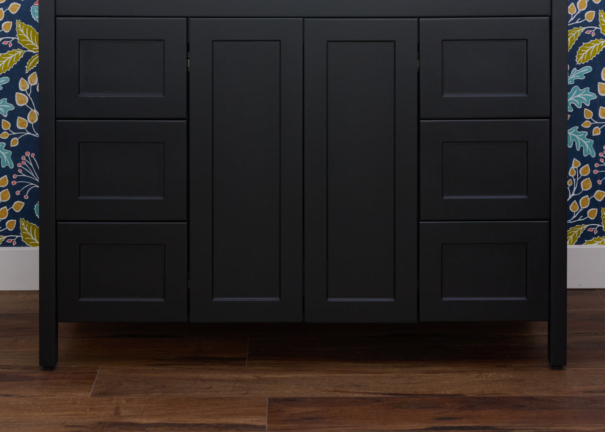 Golden retriever puppy playing with a ball